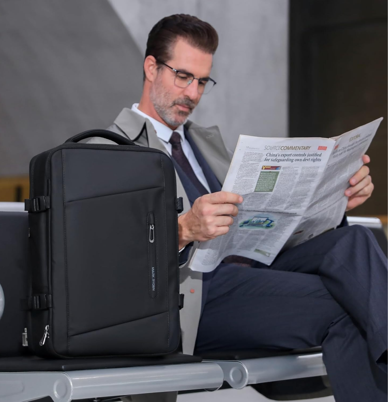 Traveller with carry-on backpack at the airport