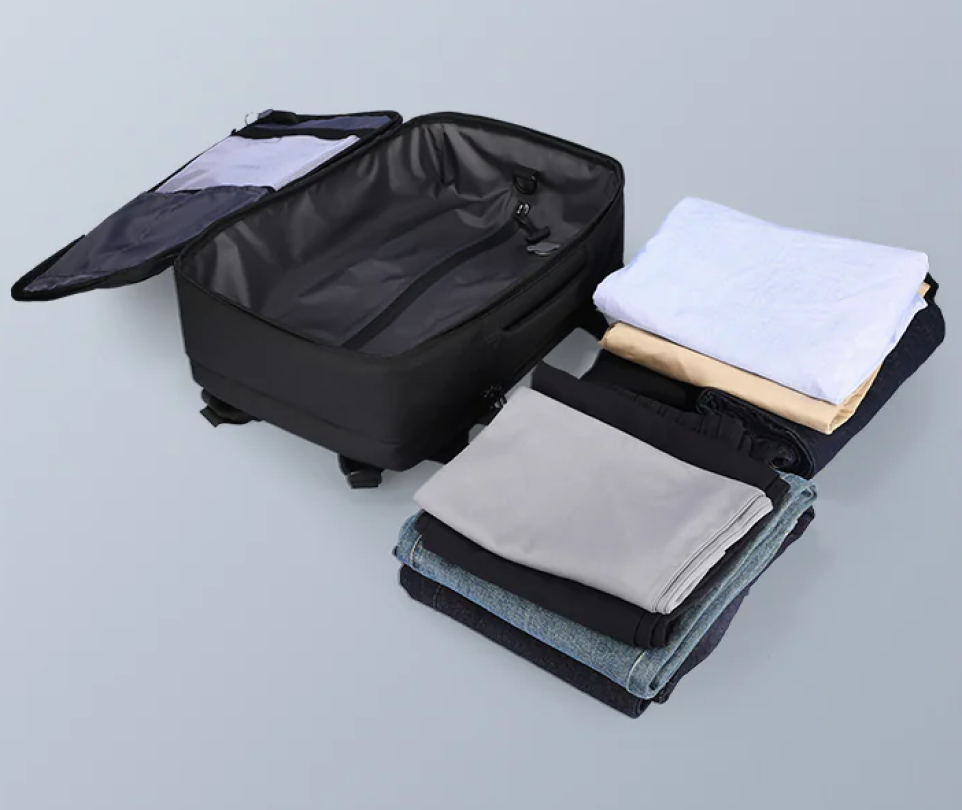 Traveller wearing a larger carry-on backpack