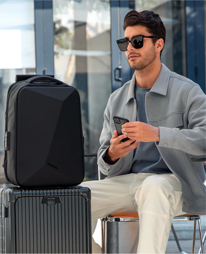 Carry-on backpack near luggage