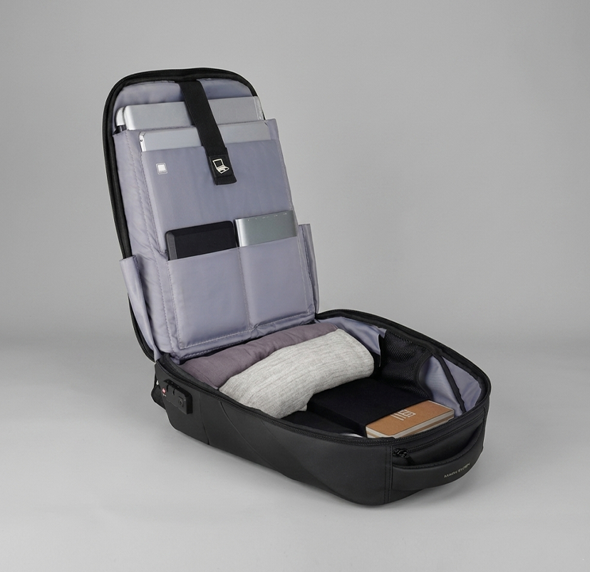 Carry-on backpack opened flat for 180 degree packing